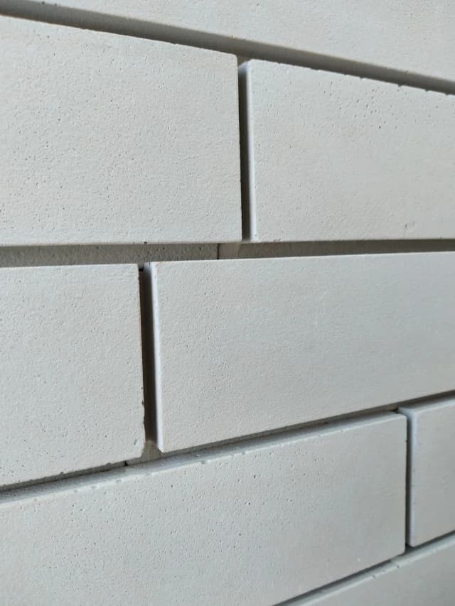 Carreau façade lisse long 5,4 x 54 cm S.01 – Gris, graphite, blanc, écru